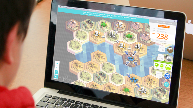 A student looking at a monitor